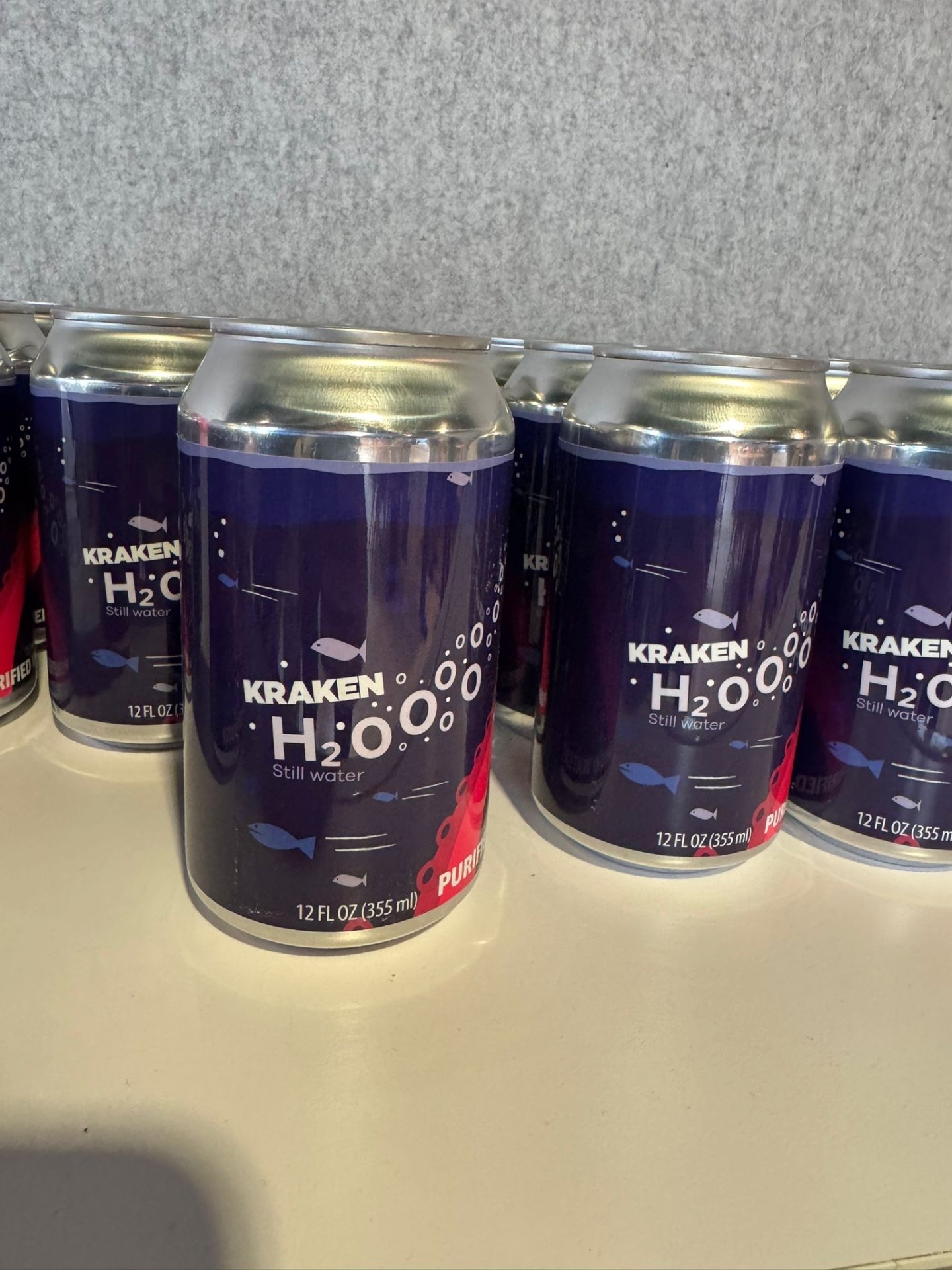 Custom-branded Kraken H2O cans on the show floor