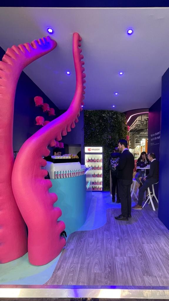 Coffee bar and hallway at the Kraken booth, Enlit Europe Milan